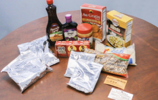 non perishable contents of bag including cards with phone numbers