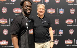Colts defensive end Kwity Paye and Gleaners CEO Fred Glass