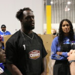 Gleaners CEO shows Colts defensive end Kwity Paye around the Gleaners warehouse.